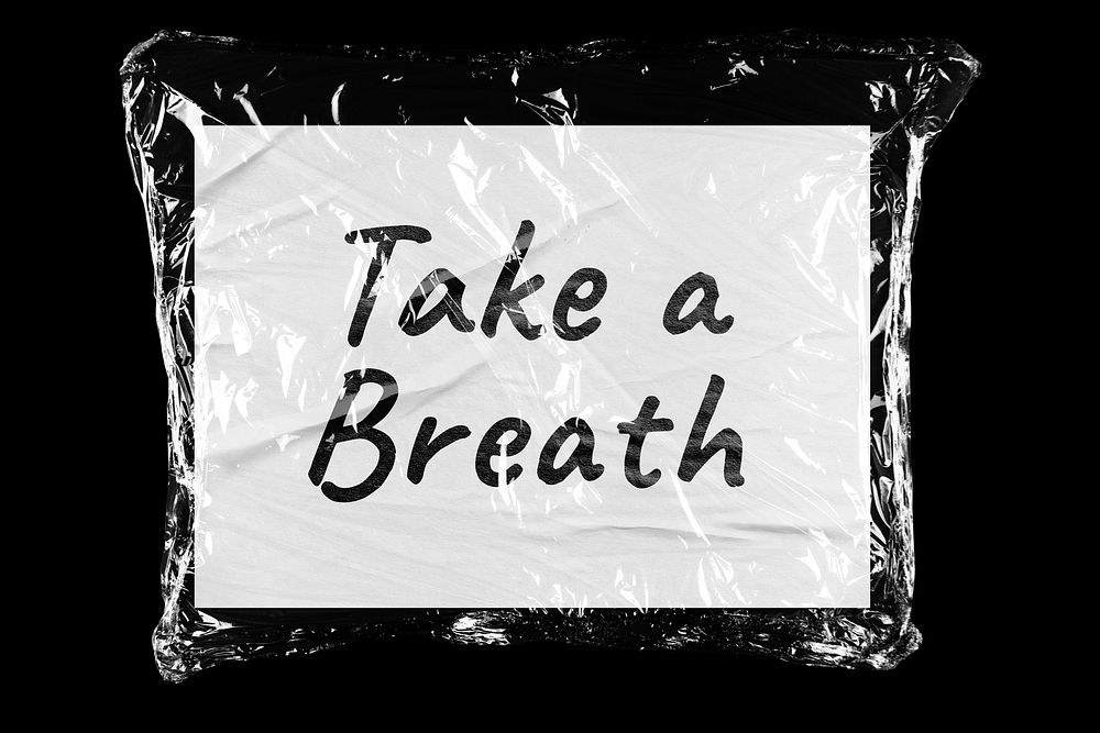 Take a breath plastic covered handwritten quote, black background
