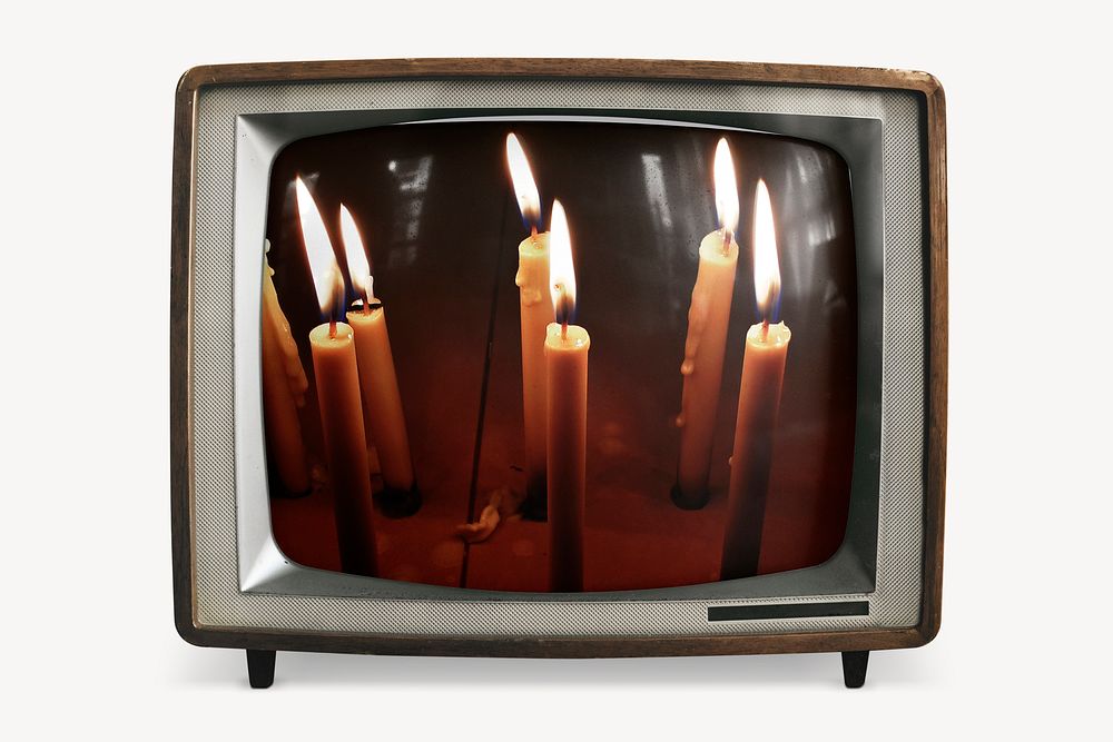 Lit candles on retro television, memorial photo