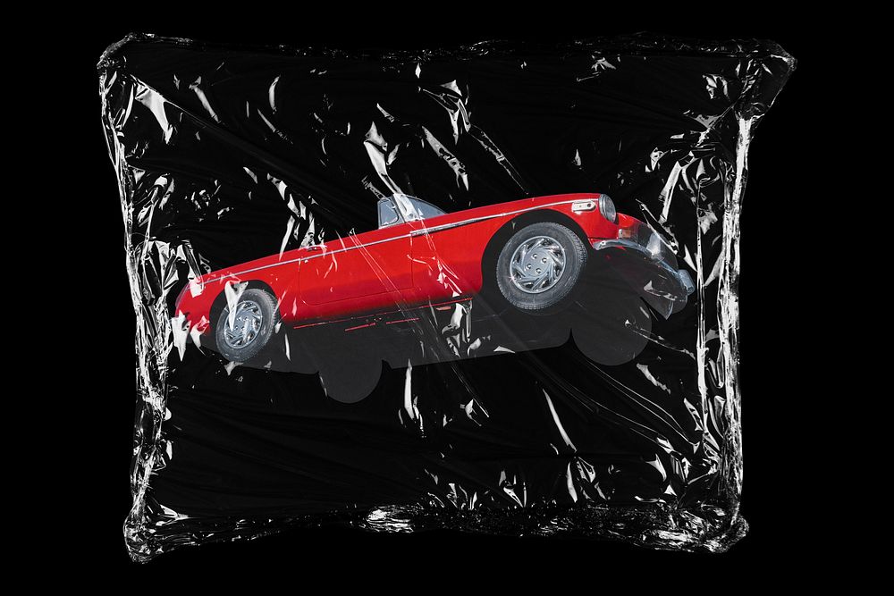 Red classic car in plastic bag, vintage vehicle creative concept art