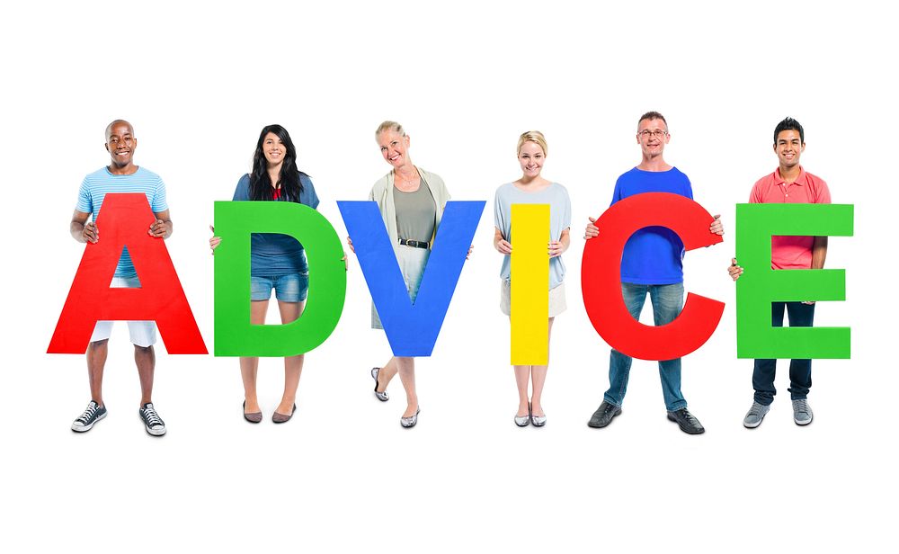 Multi-ethnic group of people holding letter "ADVICE"