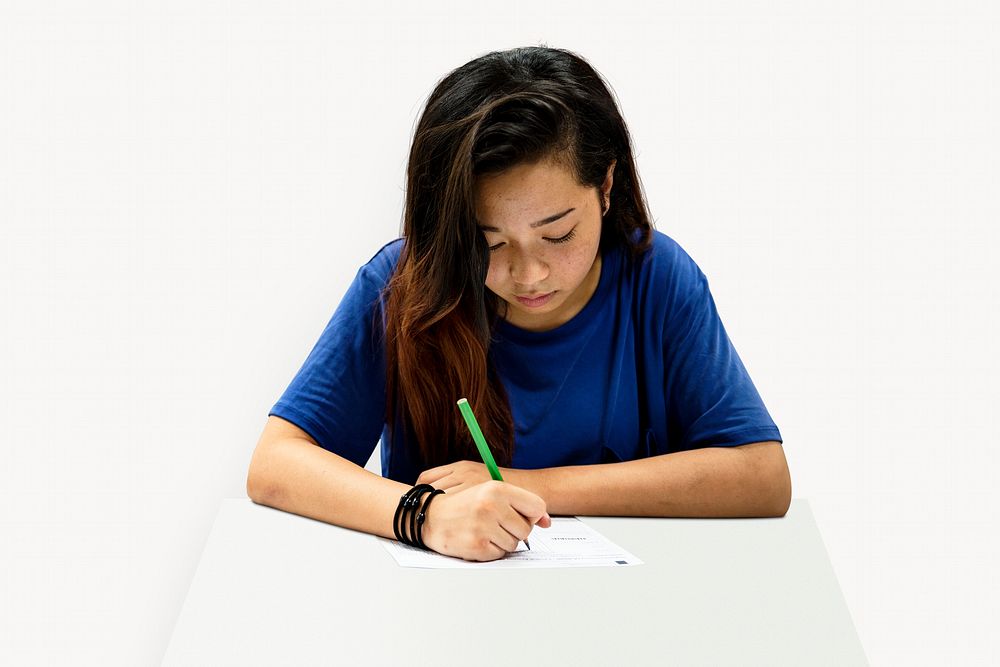 Asian girl writing, education concept