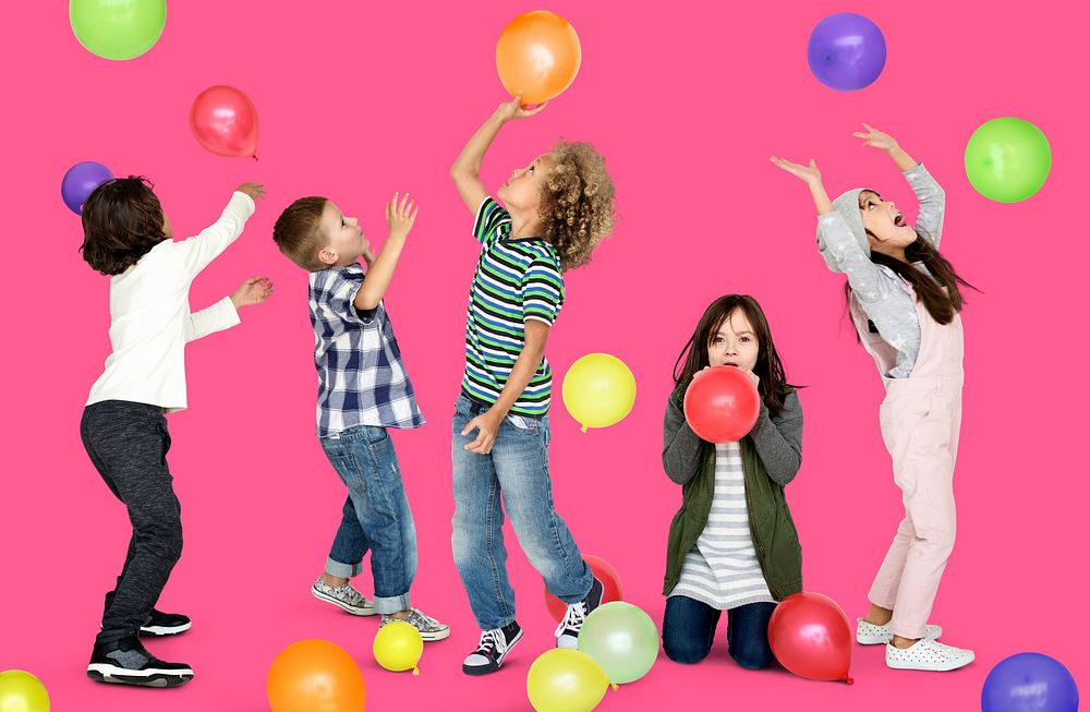 Studio shot of kids with balloons