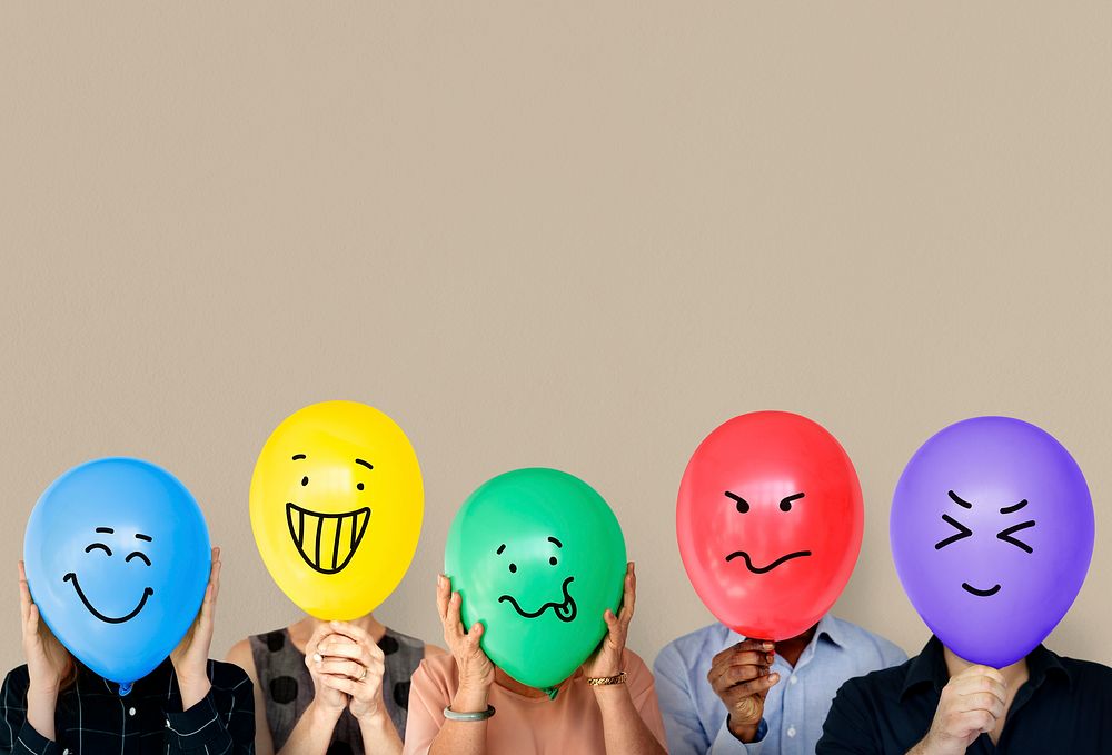 Group of people holding balloon express their emotion