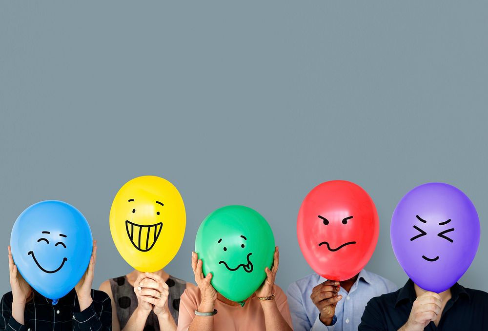 Group of people holding balloon express their emotion