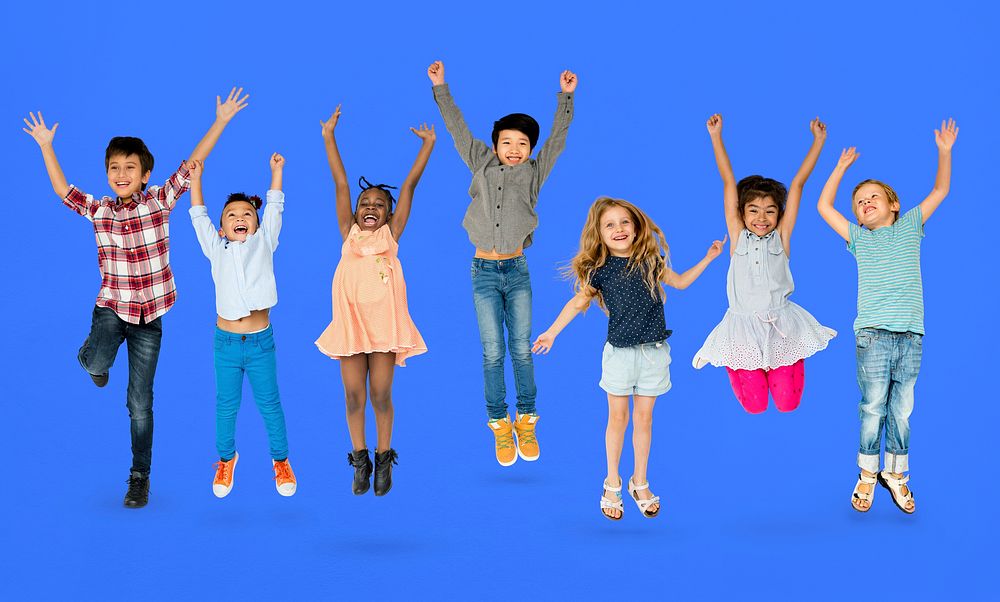 Diverse Group Of Kids Jumping and Having Fun
