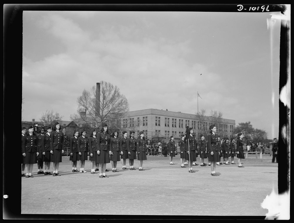 Women's Army Auxiliary Corps officers review girl cadets. In competitive drill contest among the girl cadets at Dunbar High…