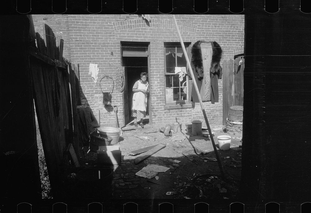 Backyard dwelling in slum area near the House office building, Washington, D.C.. Sourced from the Library of Congress.