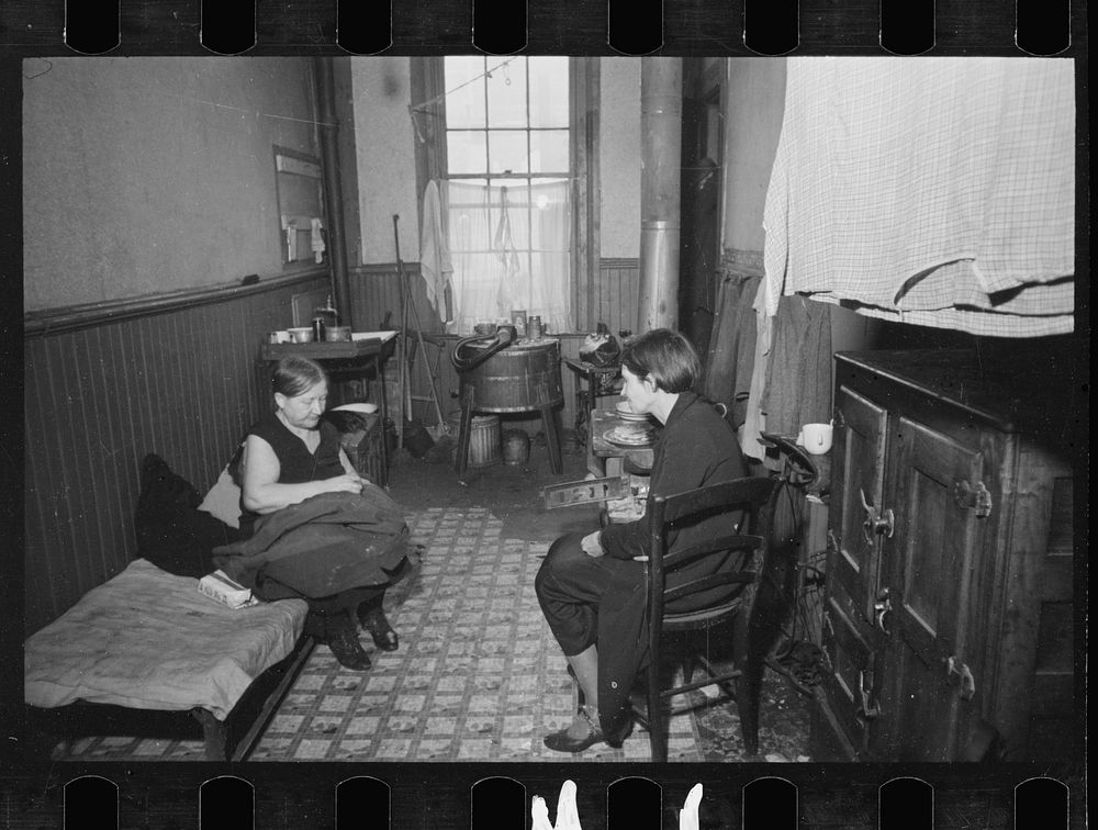 Tenement bedroom and kitchen, Hamilton Co., Ohio. Sourced from the Library of Congress.