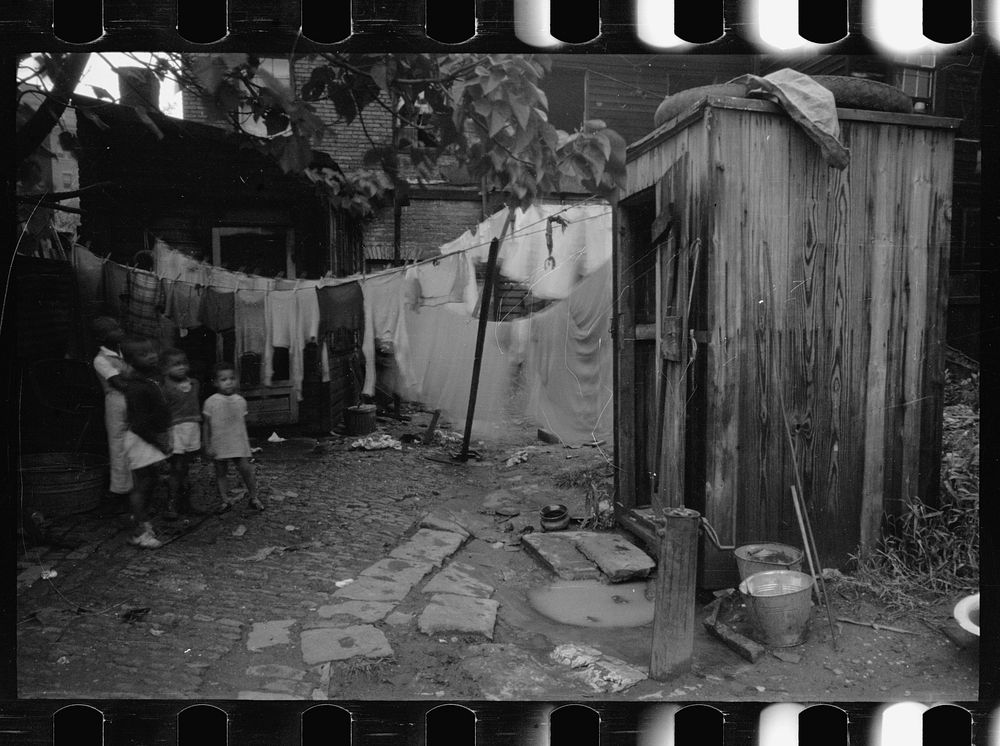 [Untitled photo, possibly related to:  slum backyard, Washington, D.C.]. Sourced from the Library of Congress.