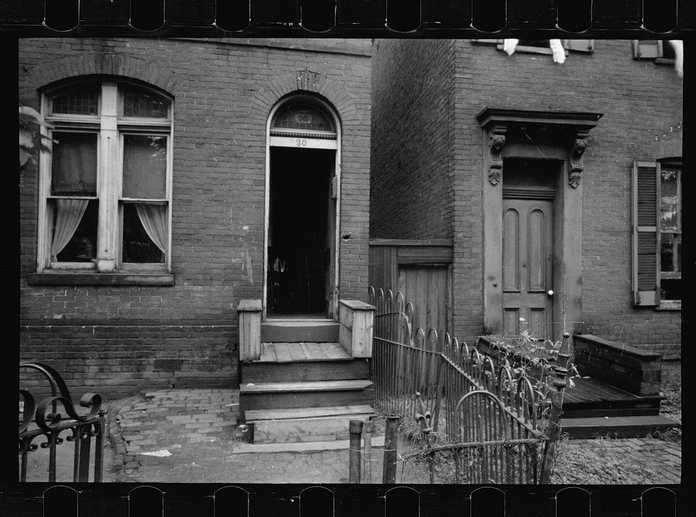 Typical house entrance near Union Station, Washington, D.C. These old brick structures are for the most part inhabited by…