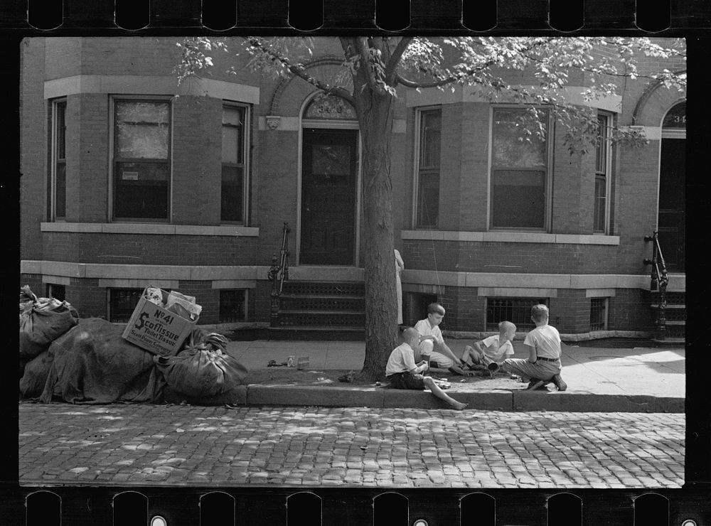 [Untitled photo, possibly related to: Children playing on sidewalk, the only available playground. Georgetown, inhabited by…