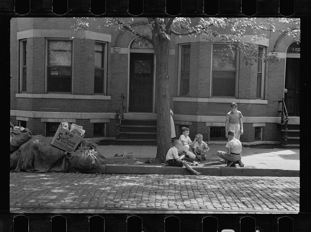 White children playing, Georgetown, Washington, D.C., using the only available playground, the city sidewalk. This section…