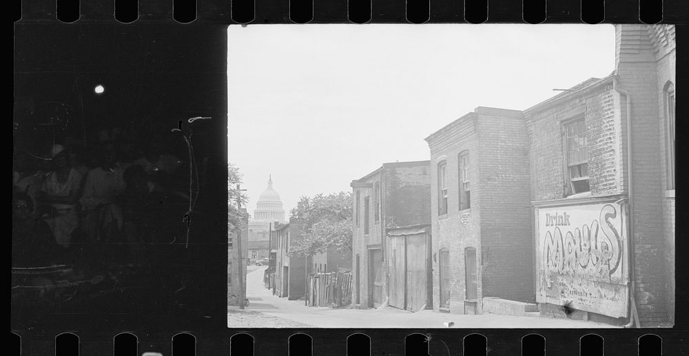 [Untitled photo, possibly related to: Slums near the Capitol, Washington, D.C. With the Capitol clearly in view, these…