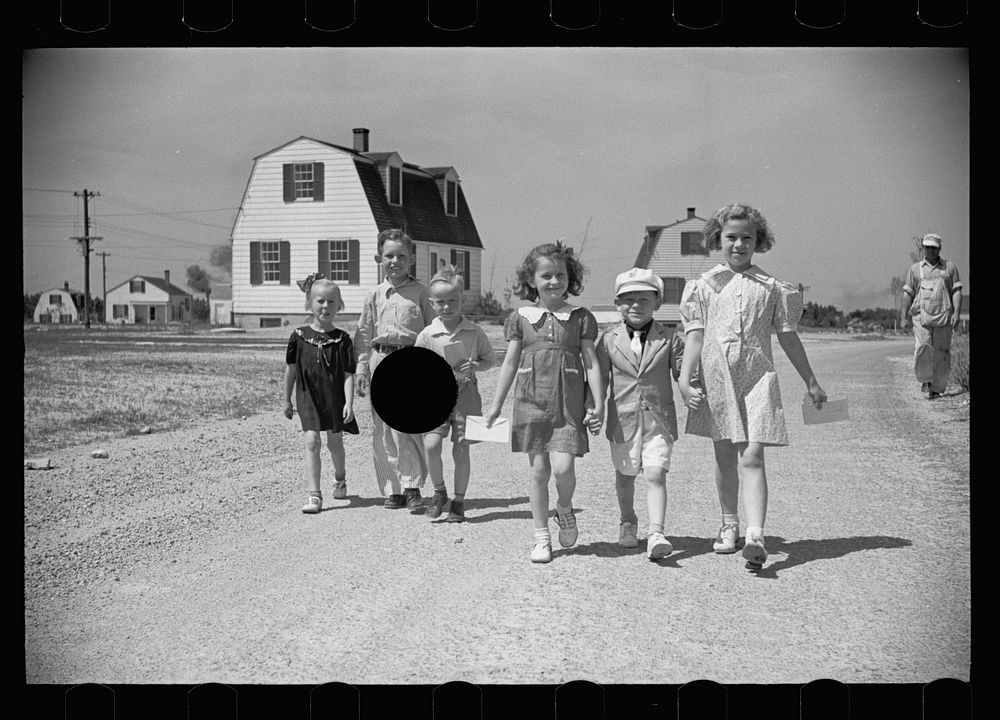 [Untitled photo, possibly related to: Homestead children coming home from school, Decatur Homesteads, Indiana]. Sourced from…