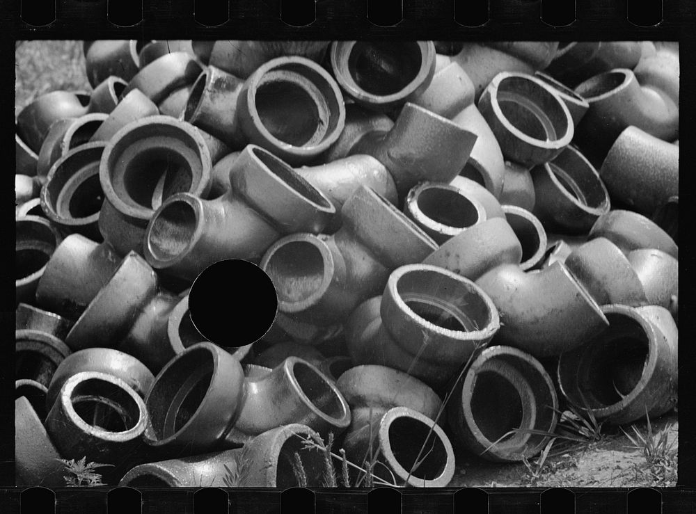 [Untitled photo, possibly related to: Sewer pipe storage, Greenbelt, Maryland]. Sourced from the Library of Congress.