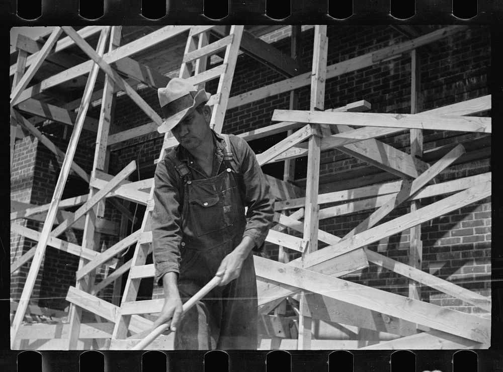 [Untitled photo, possibly related to: Carpenter at Greenbelt, Maryland]. Sourced from the Library of Congress.