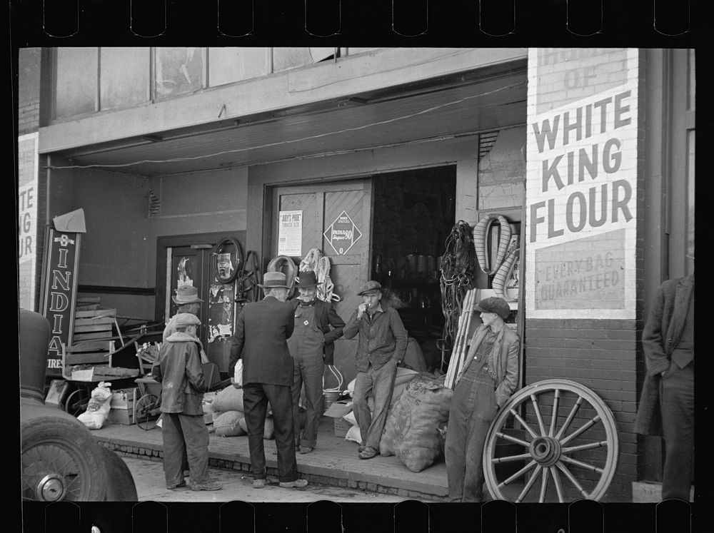 Scene in front of harness and hardware store, Newport, Tennessee. Sourced from the Library of Congress.