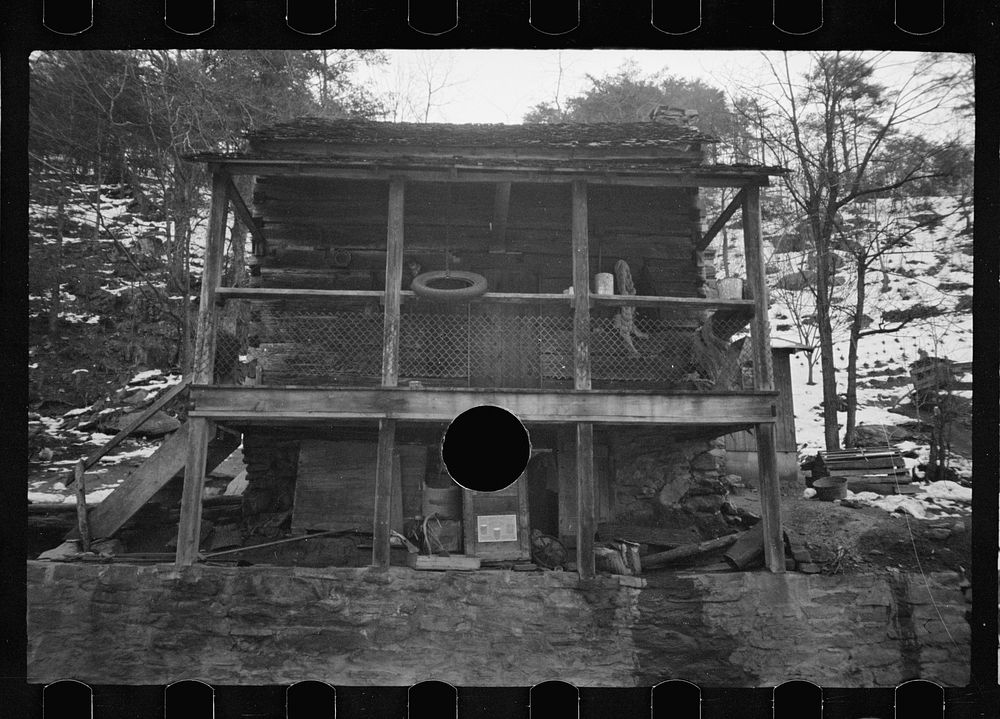 [Untitled photo, possibly related to: Mountain home, Appalachian Mountains, housed two white families]. Sourced from the…