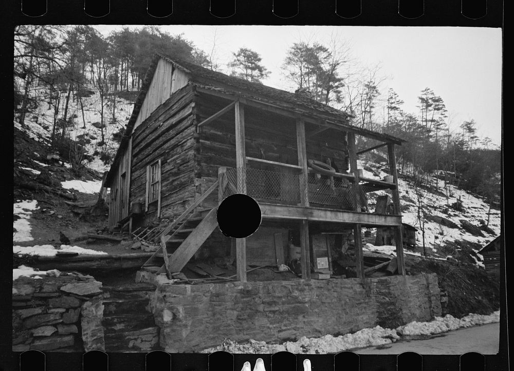 [Untitled photo, possibly related to: Mountain home, Appalachian Mountains, housed two white families]. Sourced from the…