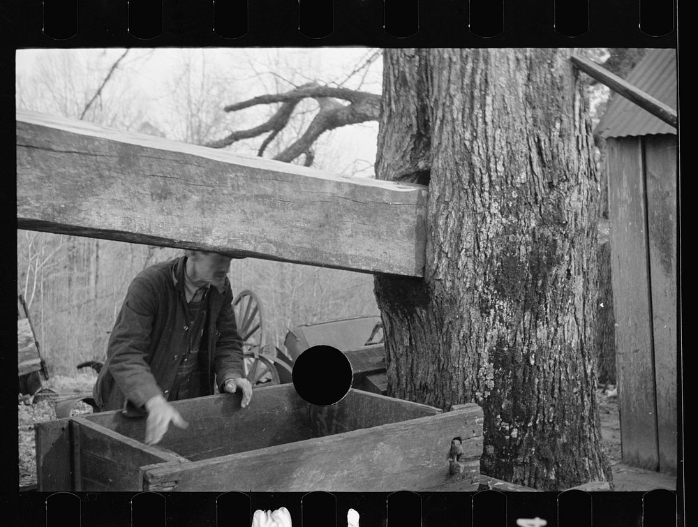 [Untitled photo, possibly related to: Demonstrating homemade cider press at Crabtree Recreational Demonstration Area near…