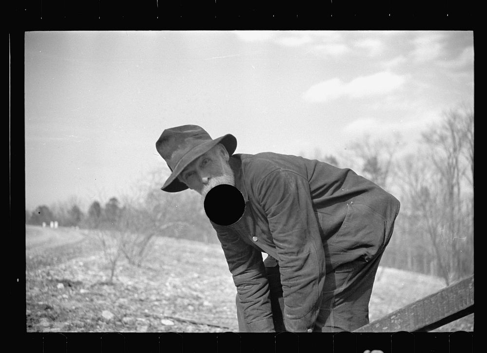 [Untitled photo, possibly related to: Demonstrating unique homemade cider press invented by man living on Crabtree…