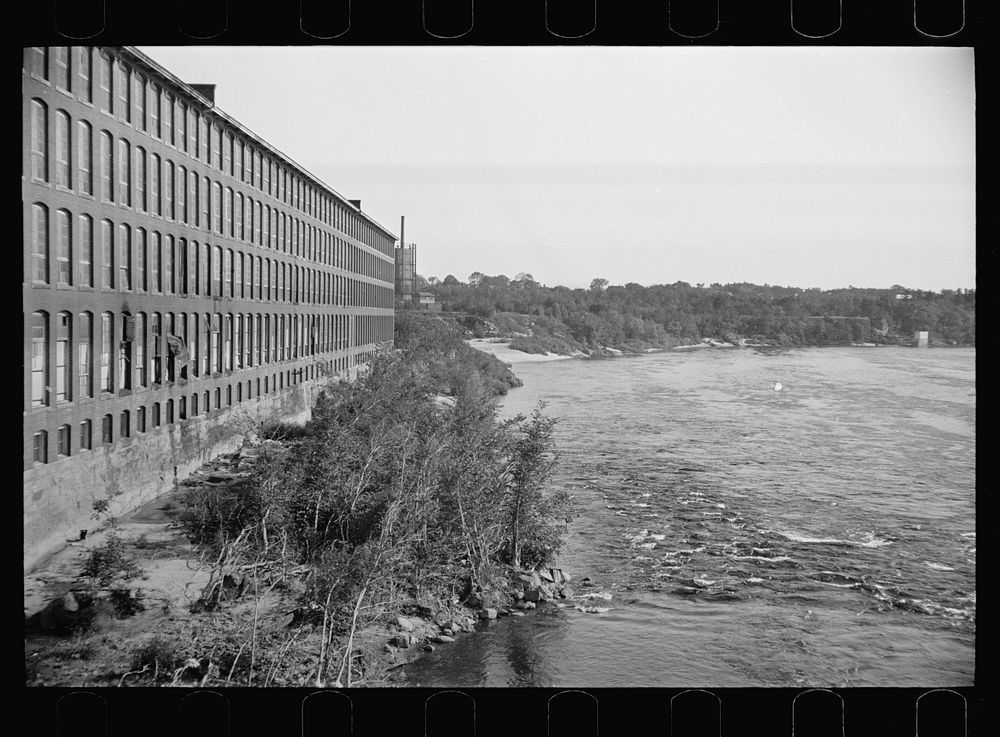 [Untitled photo, possibly related to: Section of Amoskeag looking east from west bank of river, just north of Granite Street…