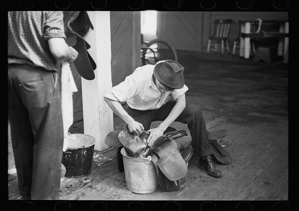 Scrubbing saddle at Eastern States Fair. Springfield, Massachusetts. Sourced from the Library of Congress.