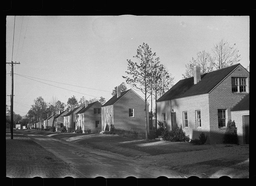 Housing project for es, Newport News, Virginia (vicinity). Row of finished homes. Sourced from the Library of Congress.