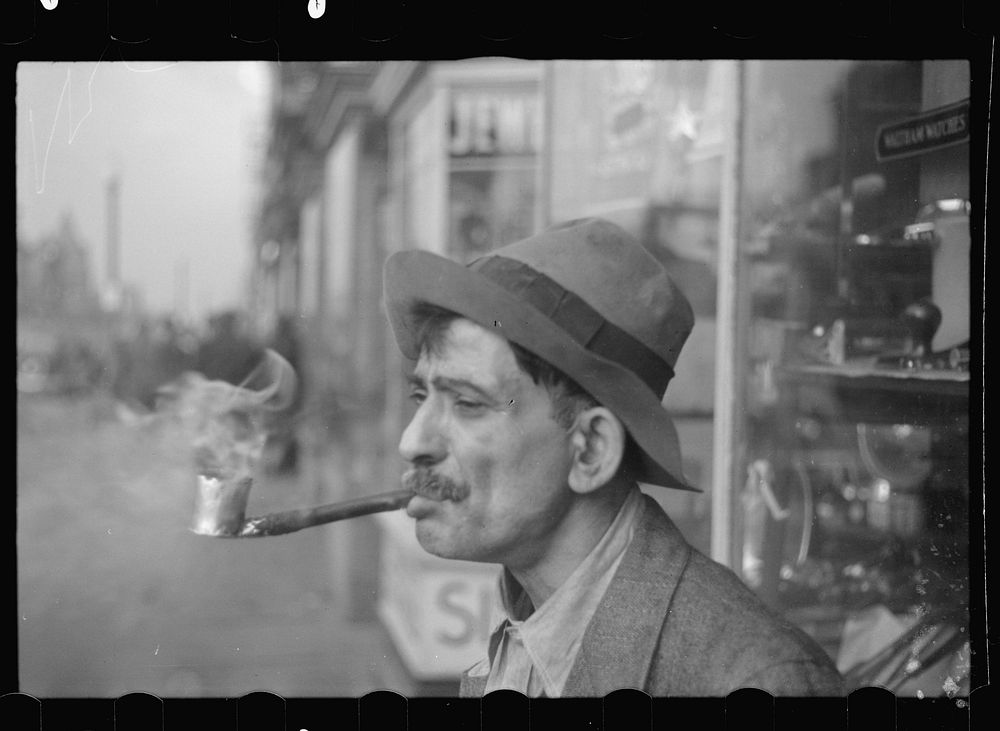 Man with homemade pipe, Washington, D.C.. Sourced from the Library of Congress.