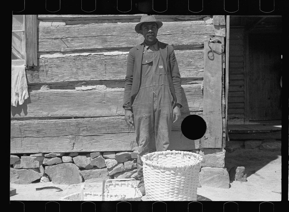 [Untitled photo, possibly related to: Nat Williamson with some of  the baskets he makes, Guilford County, North Carolina].…