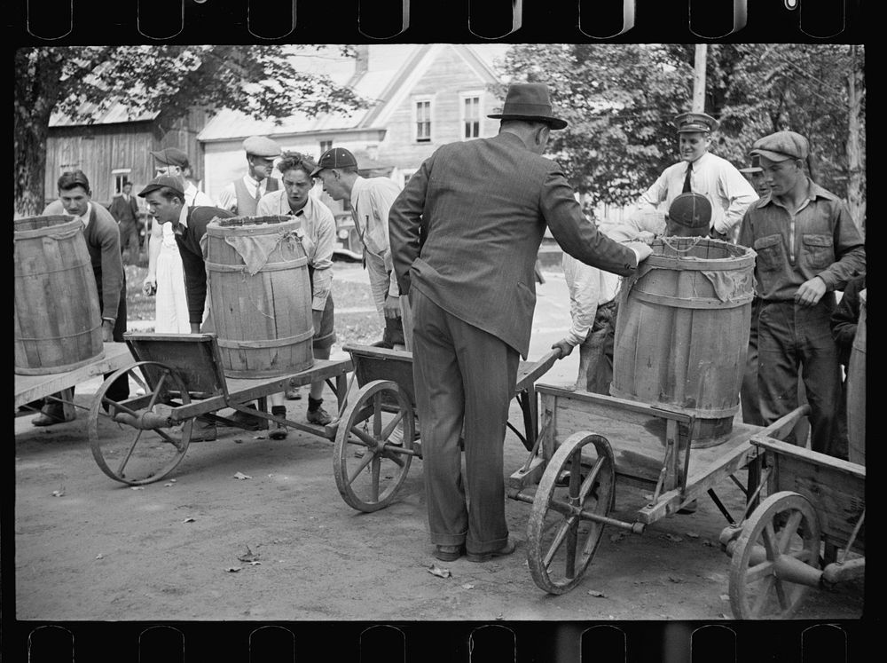 [Untitled photo, possibly related to: Fair at Albany, Vermont. The old timers take to the steps of the general store].…