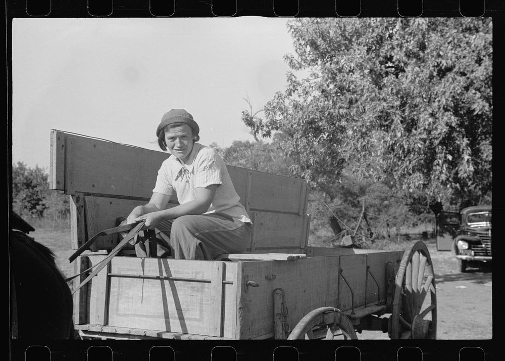 Girl who operates large farm with help of her sister and a rehabilitation loan. Coffey County, Kansas. Sourced from the…
