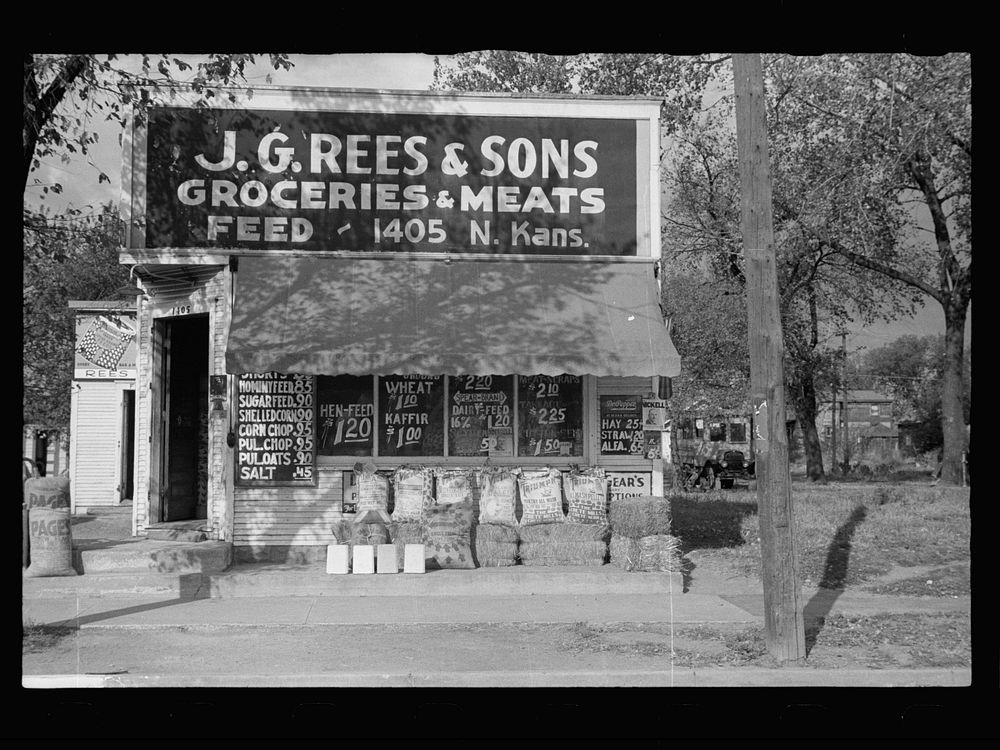 Grocery store specializing in feed and seed. Topeka, Kansas. Sourced from the Library of Congress.