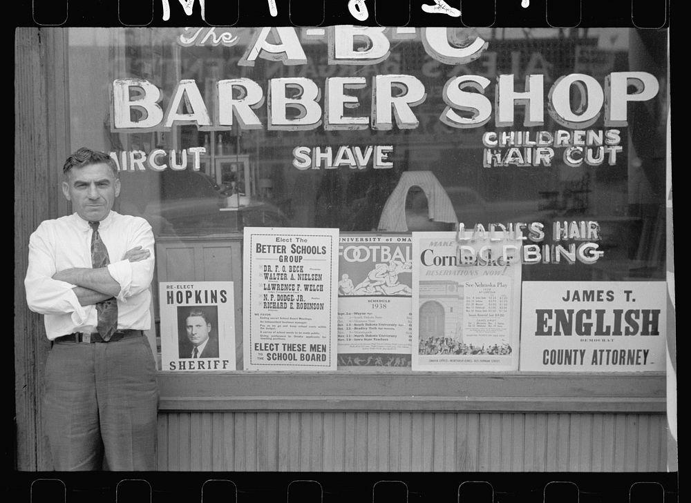 Barber and shop, South Omaha, Nebraska. Sourced from the Library of Congress.