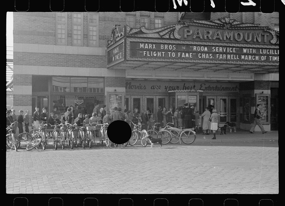 [Untitled photo, possibly related to: Saturday morning movie crowd, North Platte, Nebraska]. Sourced from the Library of…
