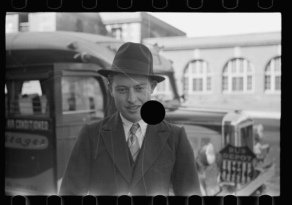 [Untitled photo, possibly related to: Boy in front of the bus depot. Grand Island, Nebraska]. Sourced from the Library of…
