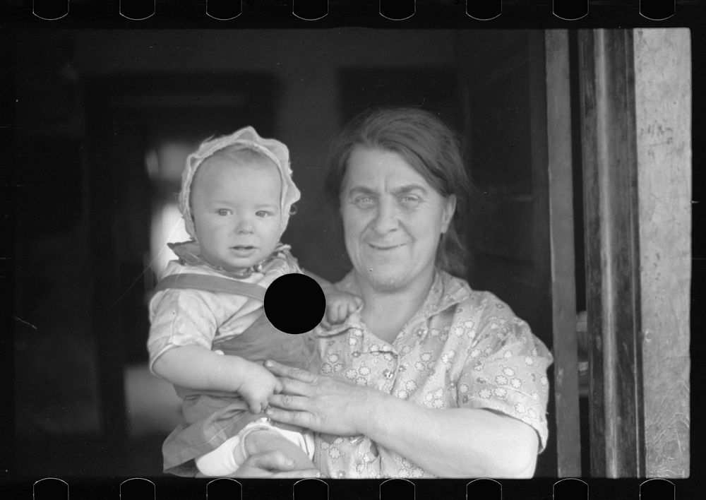 [Untitled photo, possibly related to: Wife of coal miner with grandchild. Kempton, West Virginia]. Sourced from the Library…