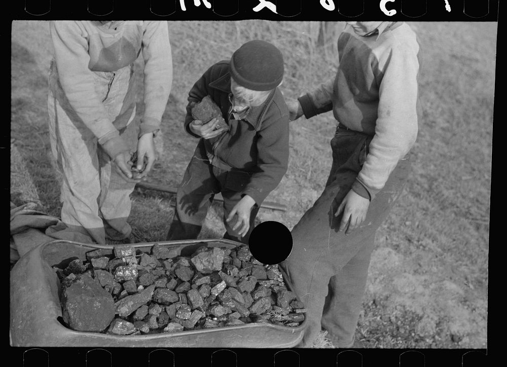 [Untitled photo, possibly related to: Miner's sons bringing home coal which they have salvaged from slag pile.  Kempton…