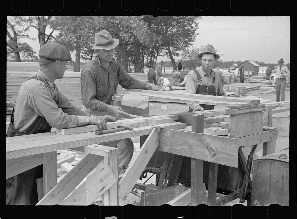 At work on prefabricated house, Roanoke Farms, North Carolina. Sourced from the Library of Congress.