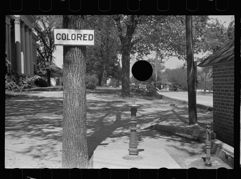 [Untitled photo, possibly related to: Drinking fountain on the county courthouse lawn, Halifax, North Carolina]. Sourced…