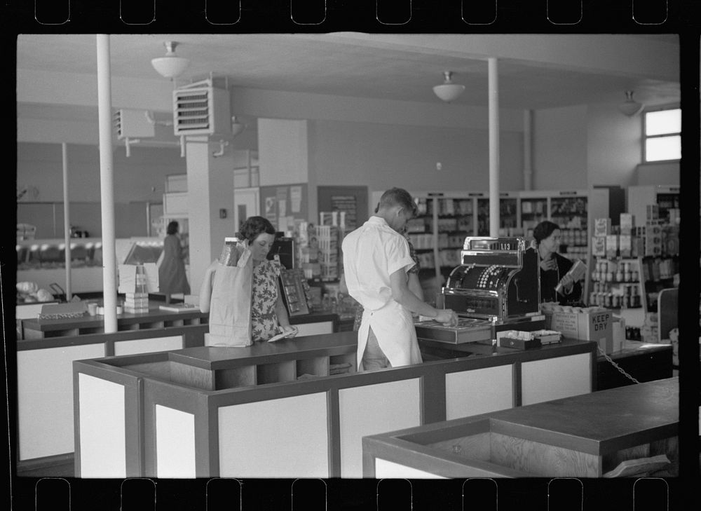[Untitled photo, possibly related to: Shopping in cooperative market, Greenhills, Ohio]. Sourced from the Library of…