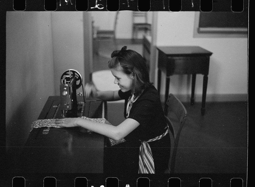 Girl sewing in home economics class, Greenhills, Ohio. Sourced from the Library of Congress.
