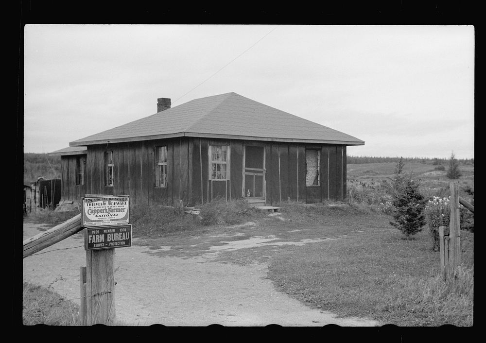 Farmhouse in Minnesota cut-over area, Beltrami County, Minnesota. Sourced from the Library of Congress.