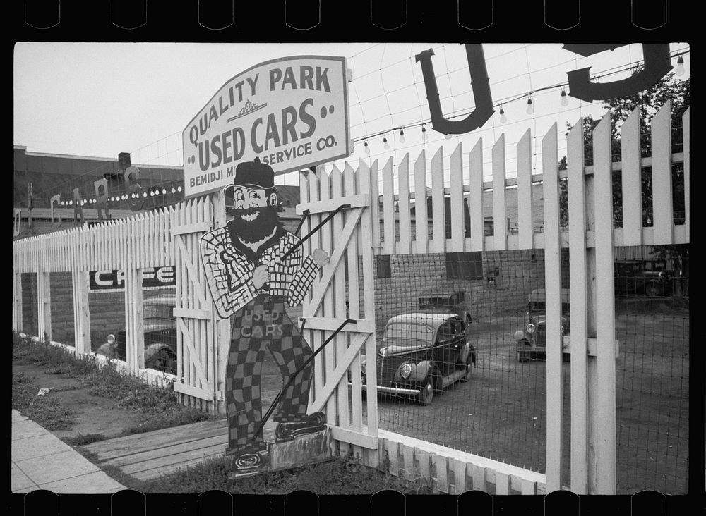 Paul Bunyan at used car lot, Bemidji, Minnesota. Sourced from the Library of Congress.