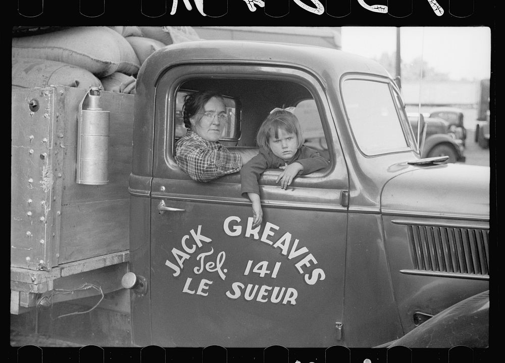 Family of trucker waiting while truck is being loaded, Minneapolis, Minnesota. Sourced from the Library of Congress.