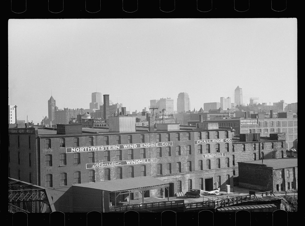 Minneapolis, Minnesota. Skyline with windmill company in foreground. Sourced from the Library of Congress.