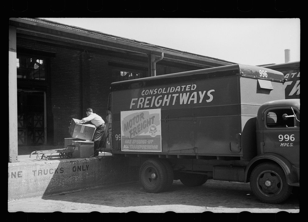 [Untitled photo, possibly related to: Trucks at terminal warehouse, Minneapolis, Minnesota]. Sourced from the Library of…