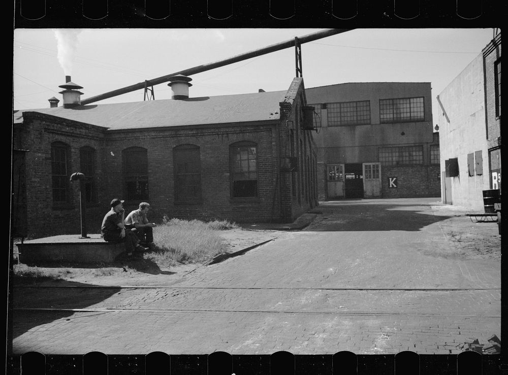 [Untitled photo, possibly related to: Lunch hour, tractor factory, Minneapolis, Minnesota]. Sourced from the Library of…