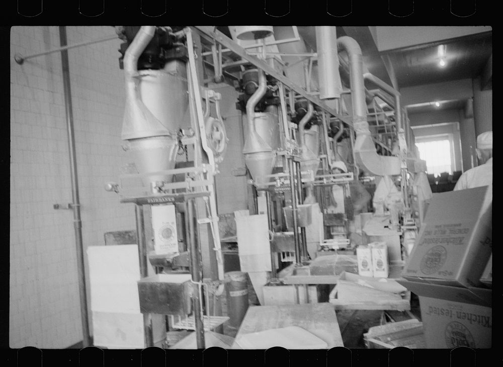 [Untitled photo, possibly related to: Packing flour, Pillsbury mills, Minneapolis, Minnesota]. Sourced from the Library of…