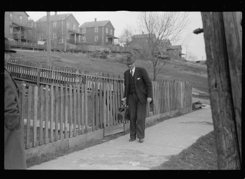 Company doctor leaving home of sick miner. Kempton, West Virginia. Sourced from the Library of Congress.